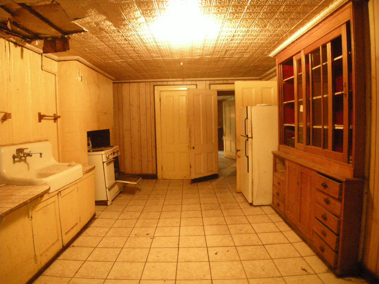 The only thing the new kitchen has in common with the old is its location at the garden level.