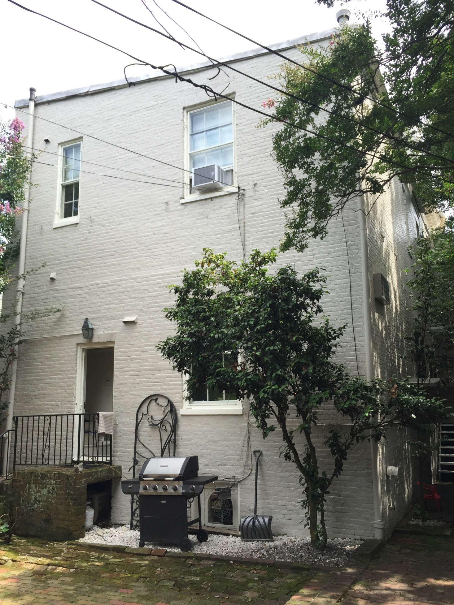 The backyard was accessed through a single door and underutilized.