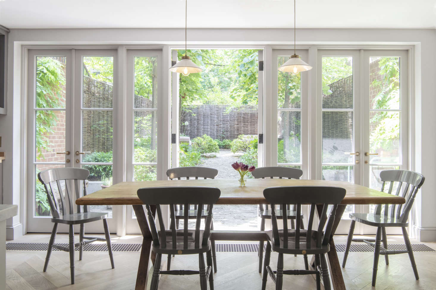The owners decided to keep the kitchen in its original location because they like the link to the garden—