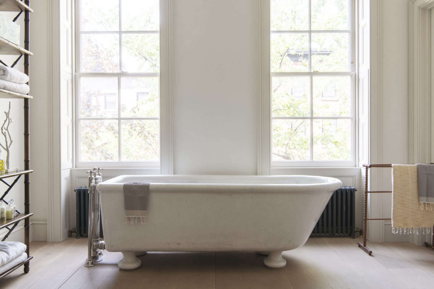 The master bath—which doubles as a study—features a six-foot-plus antique tub: mother and children can all fit in.