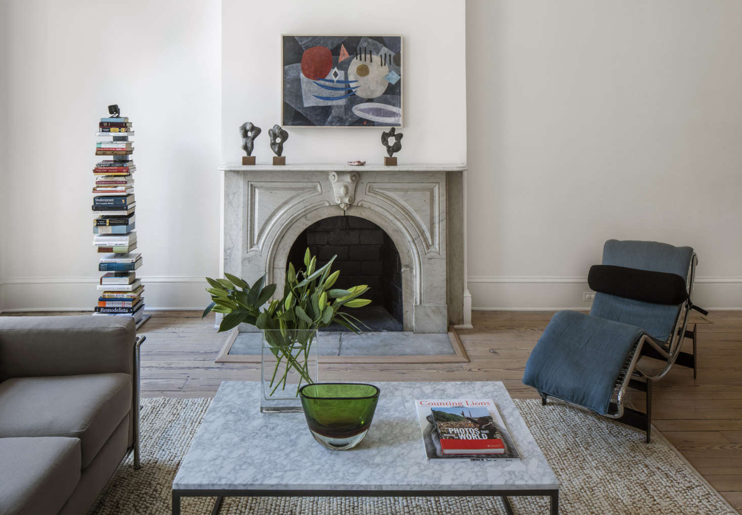 The 54 abstract painting over the mantel is by W. Mülle-Hufschmid.