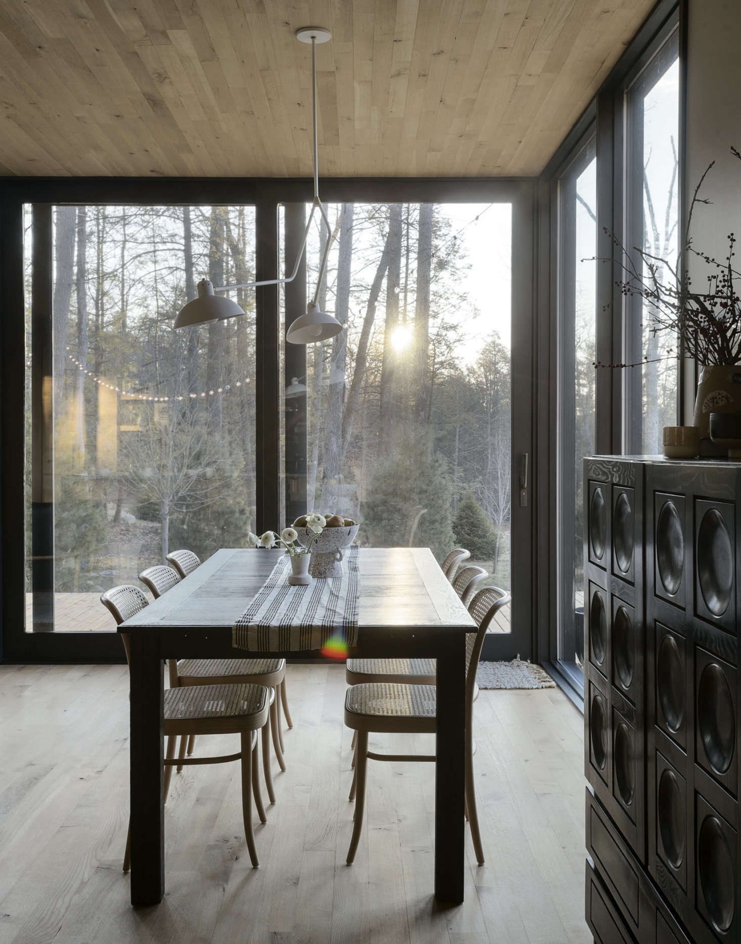 Floor-to-ceiling windows in much of the open living space put the focus squarely on the outdoors. 