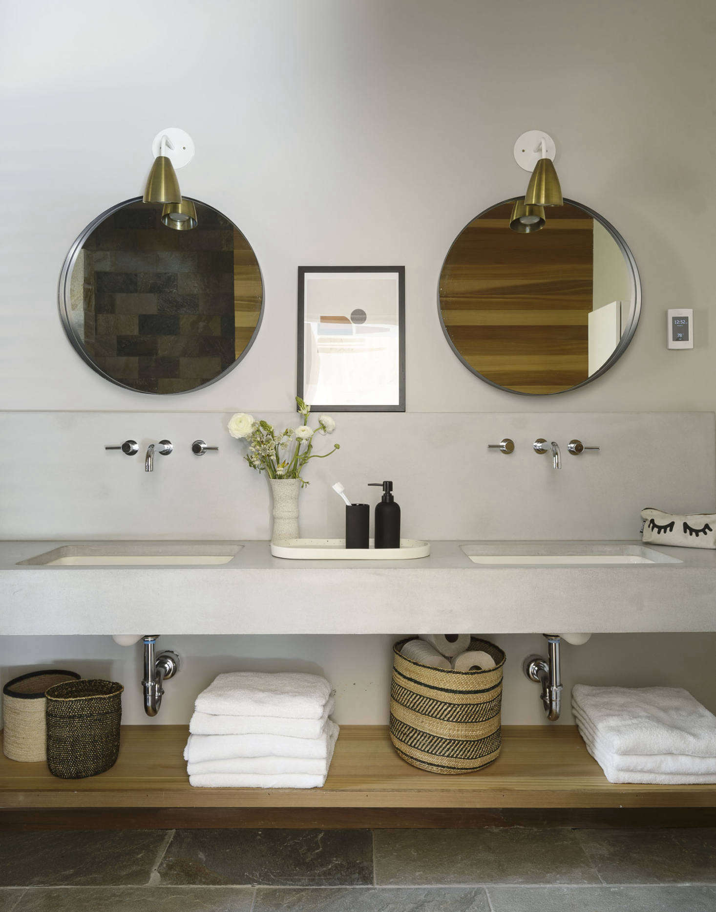 The double sink in the master bath was custom-made using fiber-reinforced concrete.