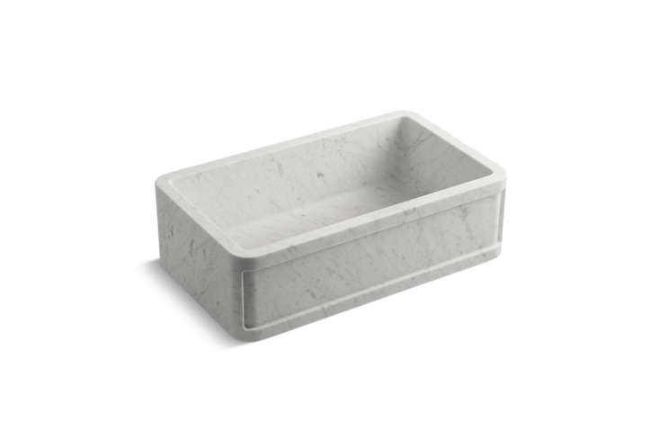 designed by michael s. smith for for town, the white carrara kitchen sink is \$ 20