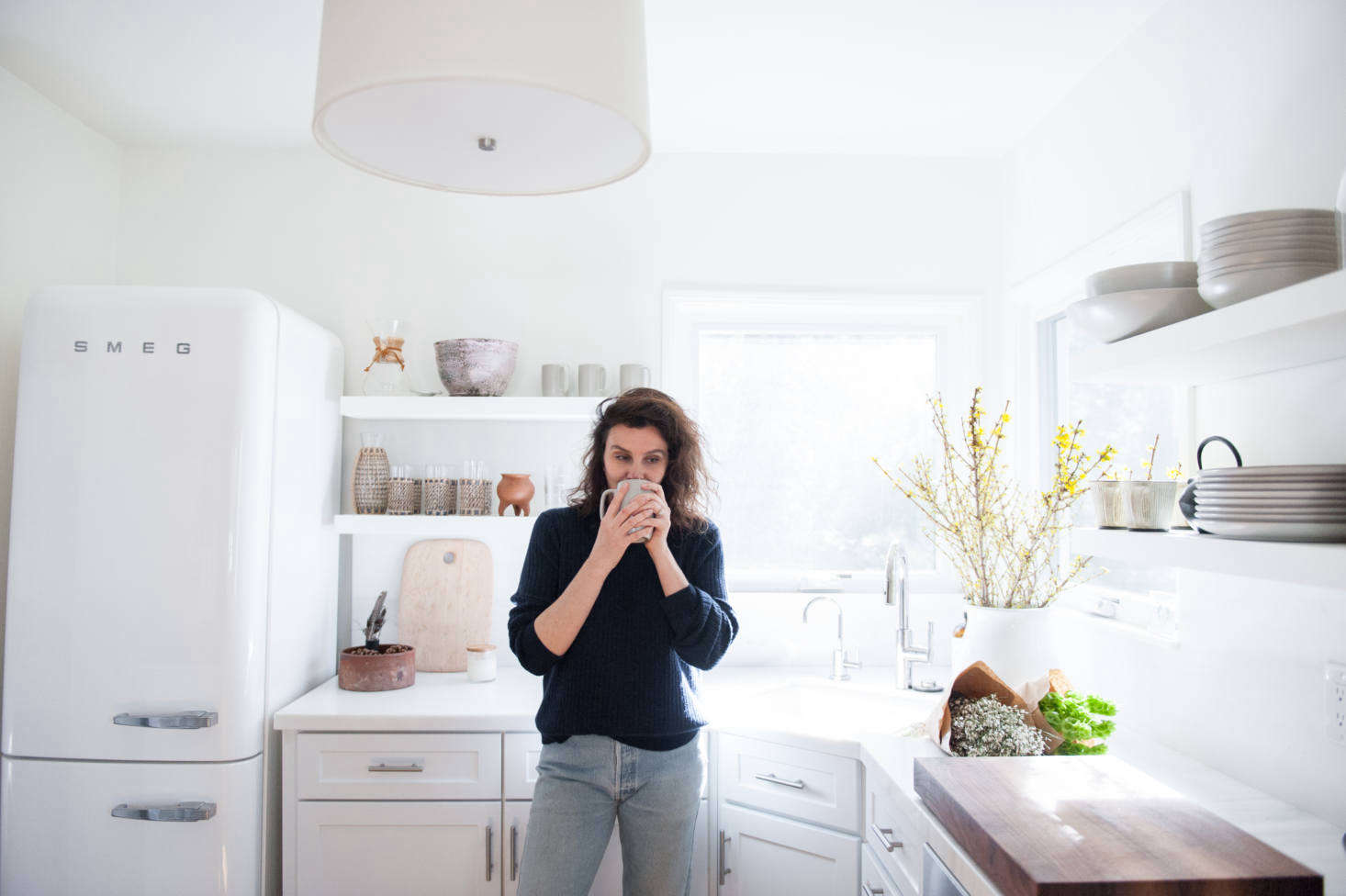 The kitchen was given a makeover using the existing cabinetry. 