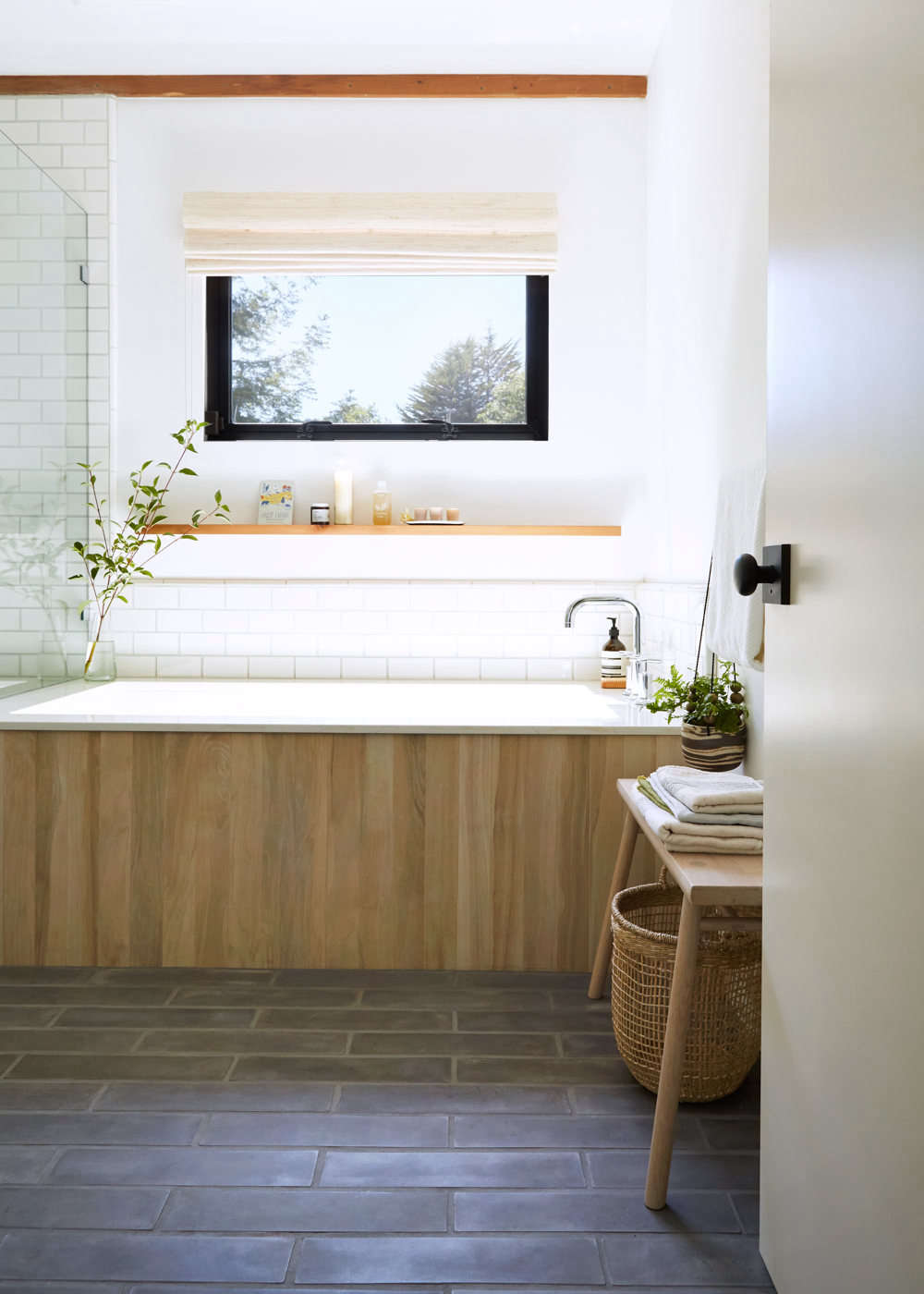 The wood-grained ceramic exterior tub tile is from Vallelunga & Co. (VL-3006 Tabula Miele). 