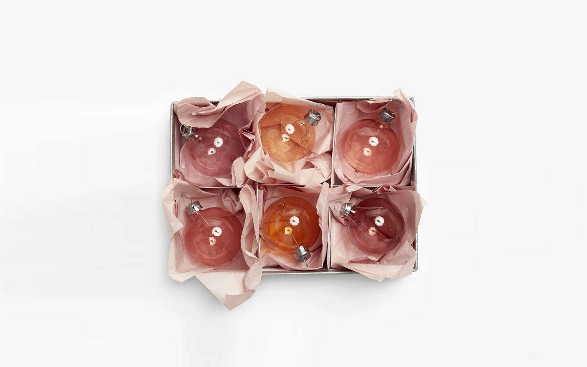 An affordable pick that looks luxe: the glass ornaments in the Boxed Ornaments Desert Set from ABC Carpet & Home are all hand-blown and one-of-a-kind; $ for a set of six.