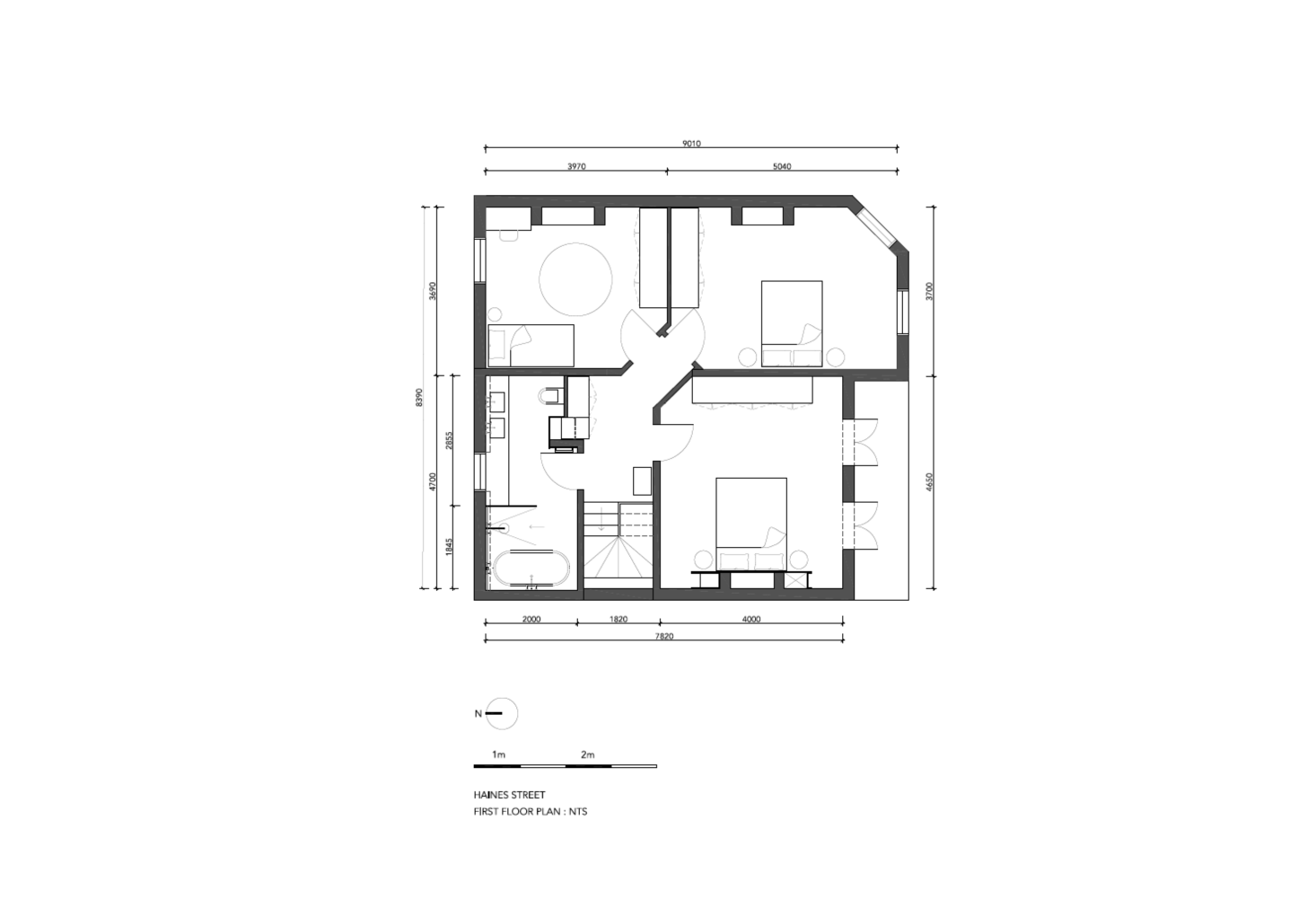 Upstairs, there are three bedrooms and a shared bath.