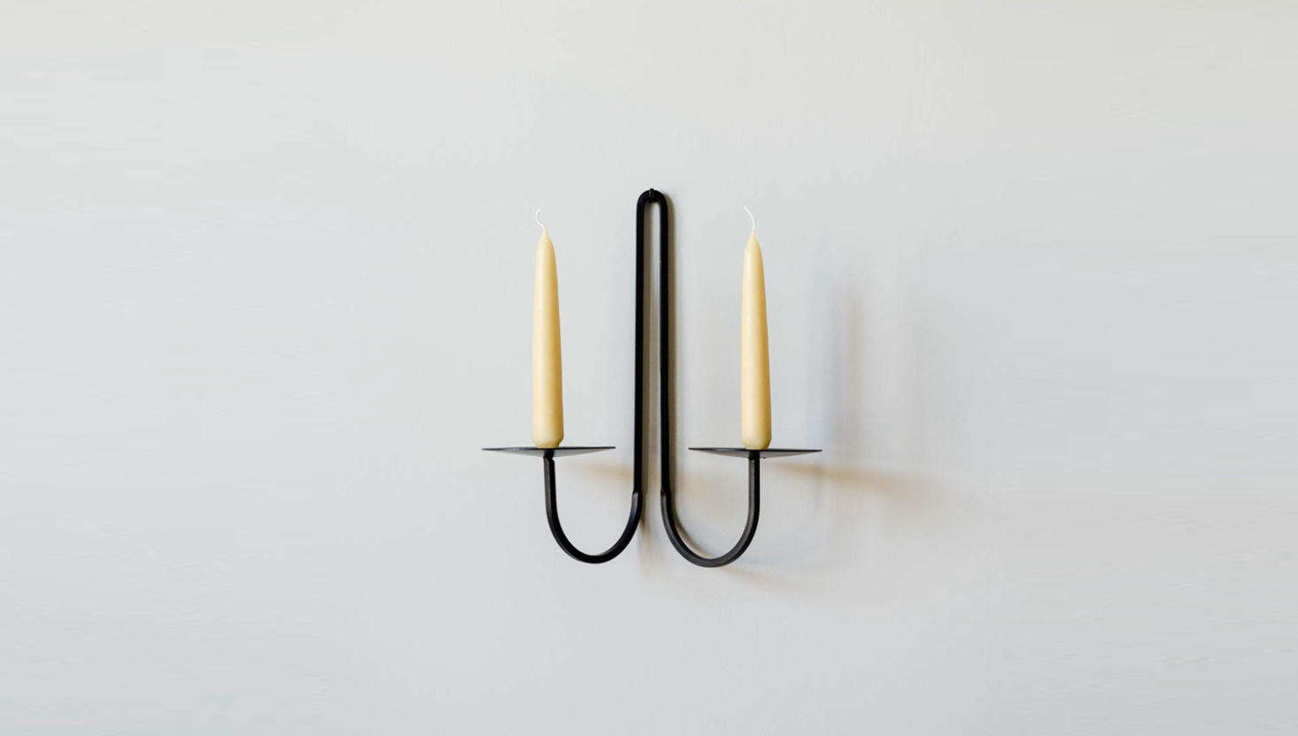 The smaller Iron Double Arm Candle Holder is $47 from June Home Supply (though it