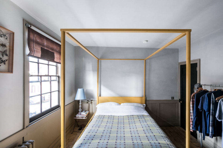 The palette in this bedroom echoes the one in the kitchen. Felgueiras was mindful of not only using historical paints but also adhering to period-appropriate building techniques when possible. For instance, the walls were built using a traditional lath and plaster (mixed with horse hair) technique.