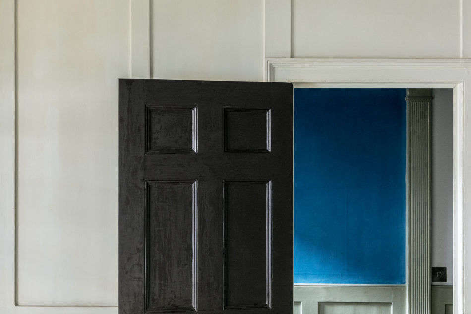 His favorite dash of color in the house: the blue verditer painted onto handmade sheets of paper from Griffen Mill in Ireland. He had been testing out the color for the Strawberry Hill House project but ended up keeping it up in his home.
