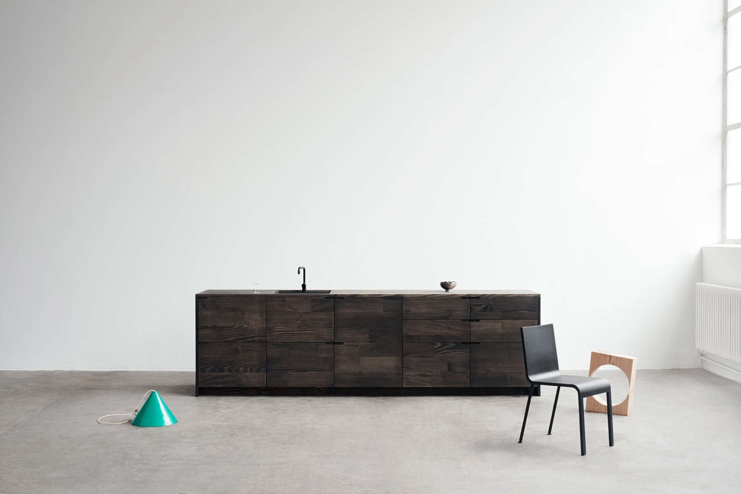 The UP kitchen in dark oiled Douglas fir.