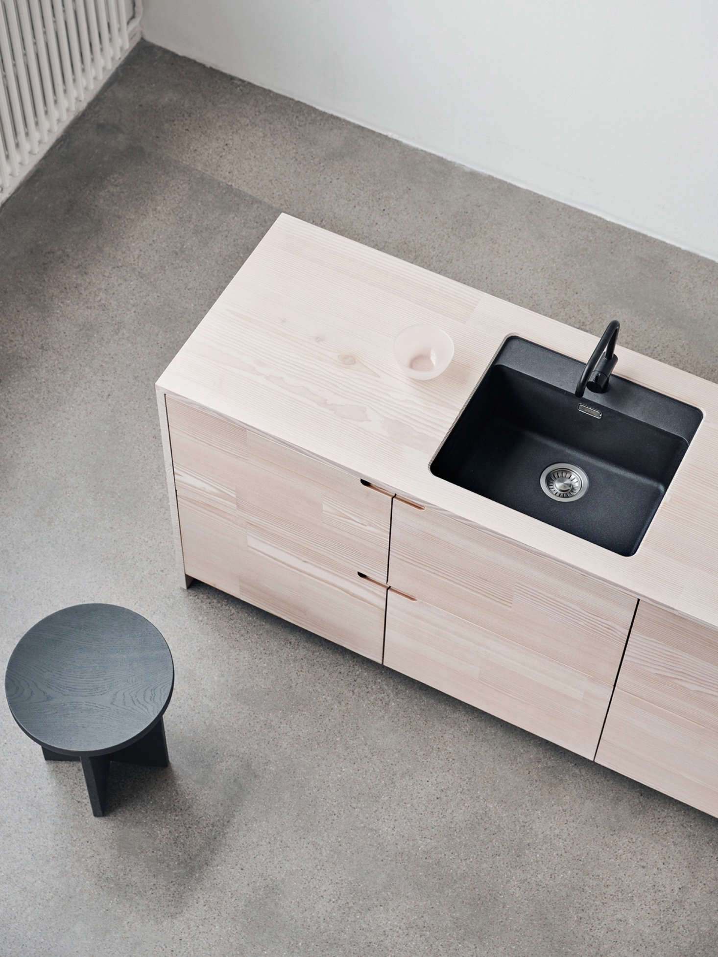 The countertops are made of the same solid, reclaimed Douglas fir from Dinesen that is used for the fronts.