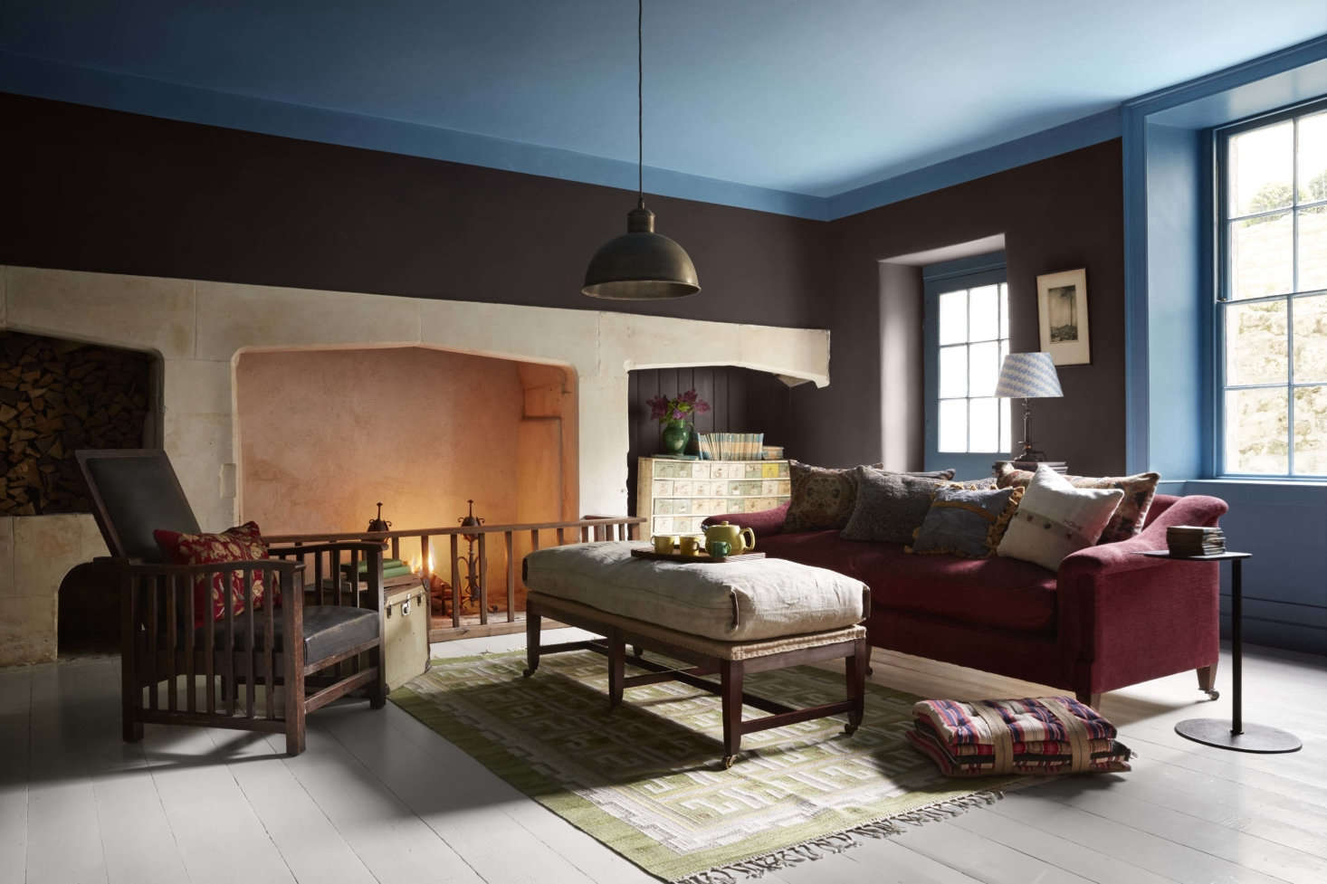 The kitchen was originally set downstairs in the partially above-ground basement, now used as a family room or 