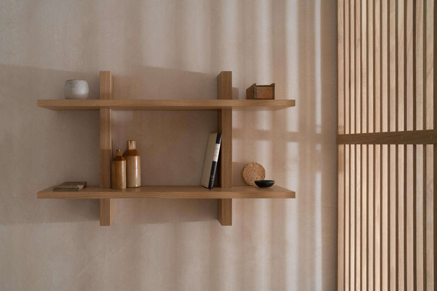 Oak shelving in the bedroom.