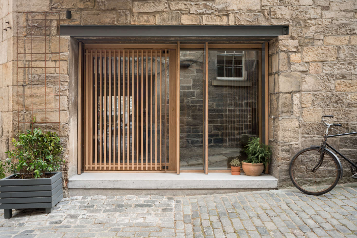 The property was one of the last remaining undeveloped spaces in Old Town reports Jack. And no wonder: all of its windows were closed up and it was dark and dank—and used in recent decades as, of all things, a stained glass studio.