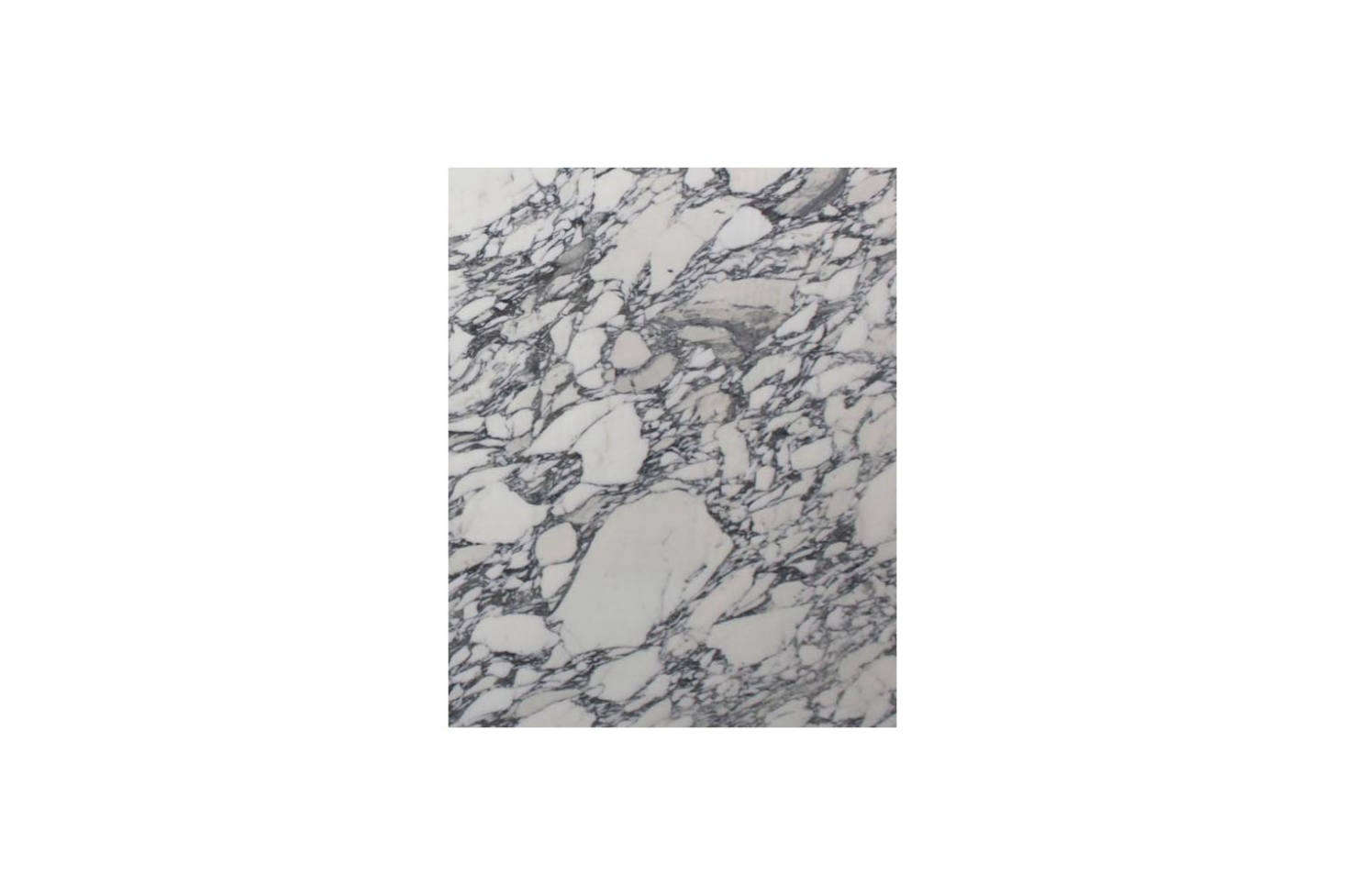 The backsplash behind the basin is designed with Arabescato marble. For something similar with dark veining, Tristone & Tile in California offers the Arabescato Corchia data-src=