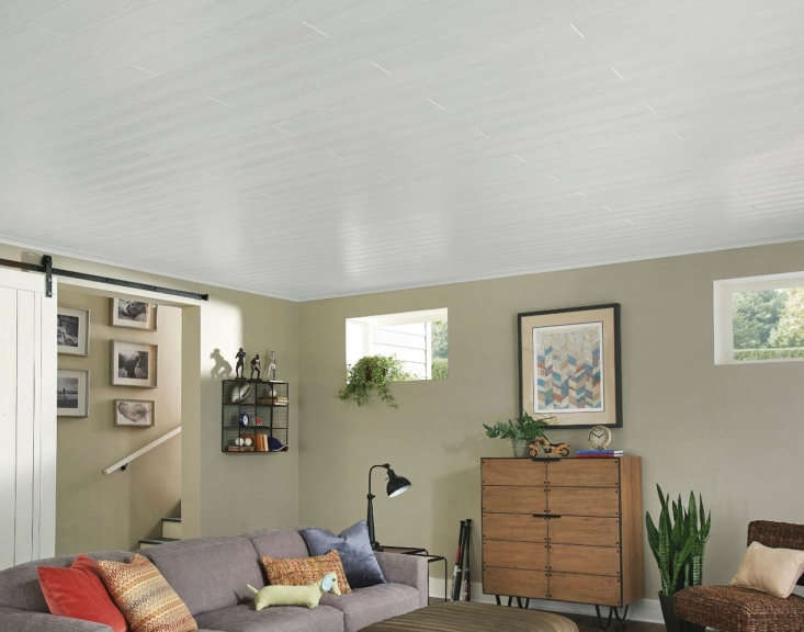 this basement has an unexpectedly airy feel thanks to armstrong ceilings&#8 18