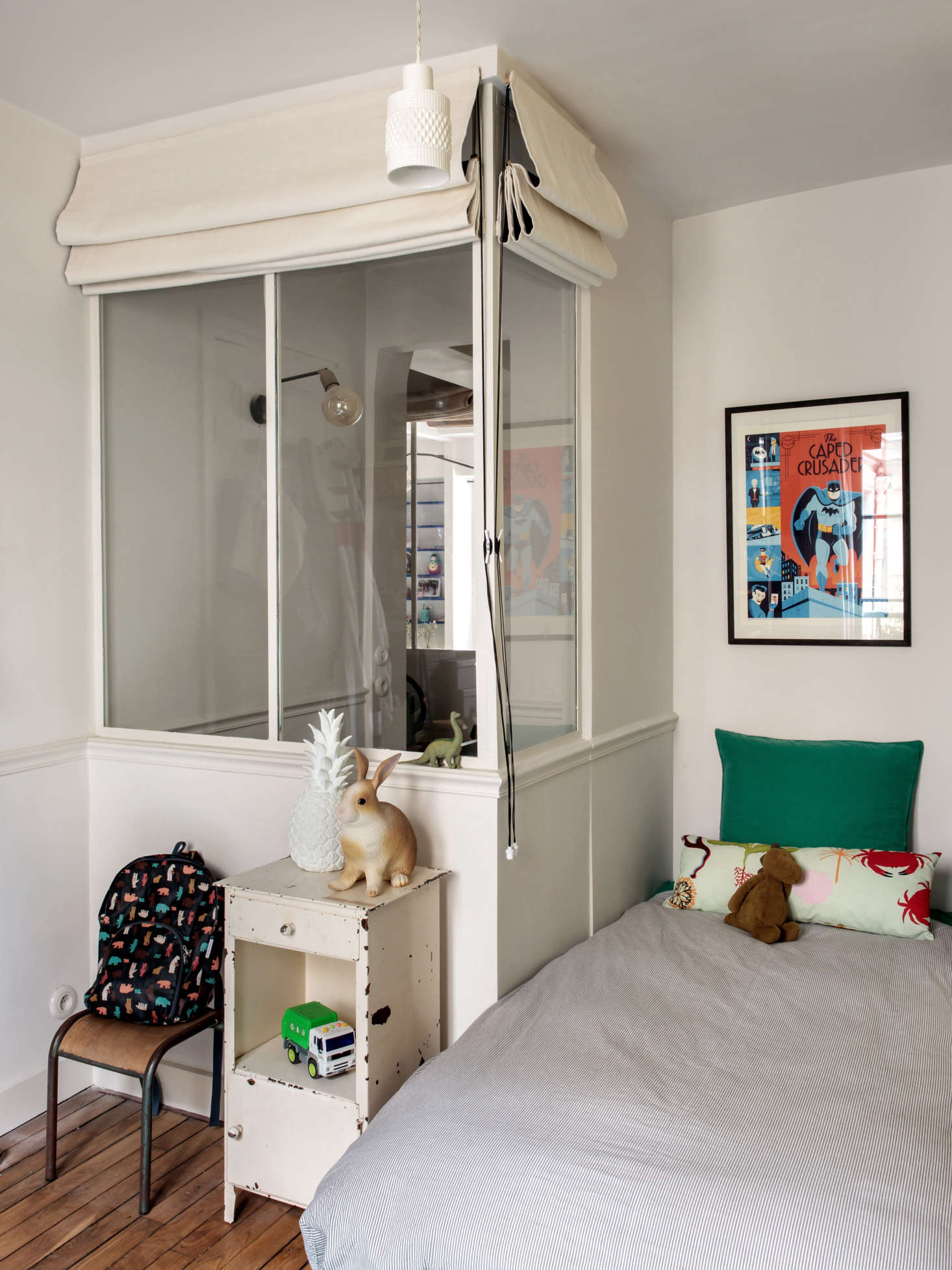 At the top of the spiral stair, Hermand inserted a windowed vestibule in a corner of her son
