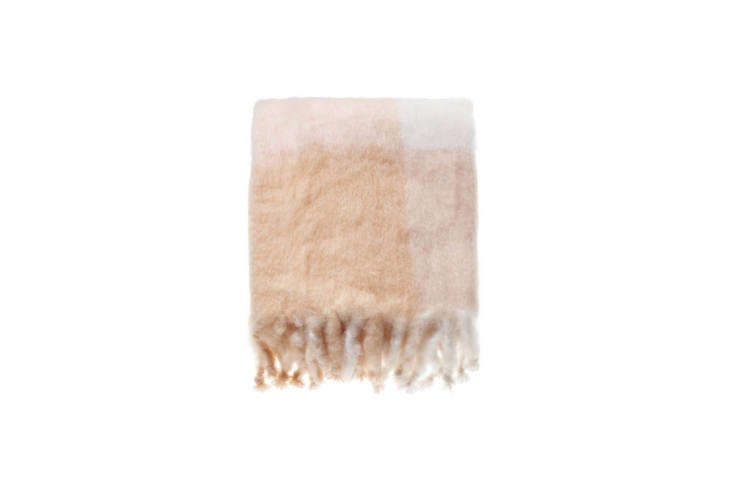 available at tiina the store in amagansett, new york is the mohair blanket cham 21