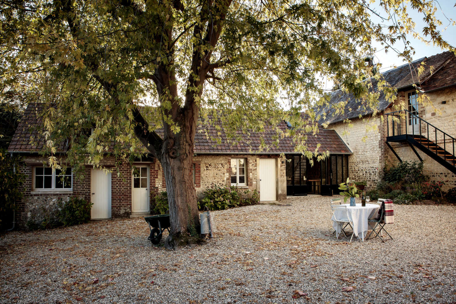 In the courtyard, early-th century outbuildings are the remains of a farm that pre-dates the house. Newly shored up, this annex serves as extra guest quarters.