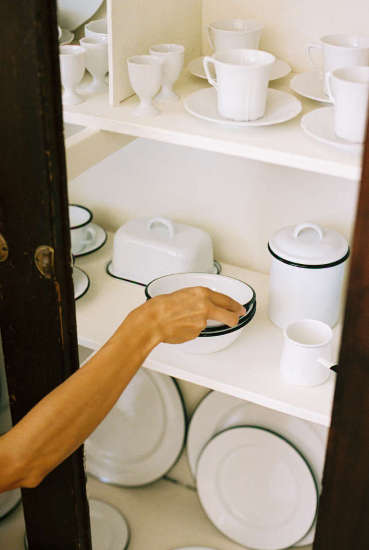 in the cabinet, a slew of enamelware, made in france and belgium and starting a 23