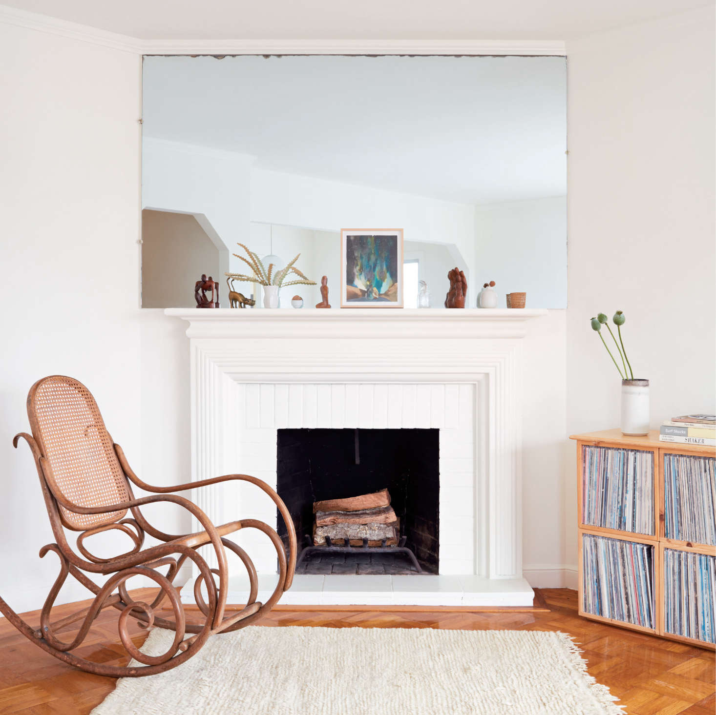 A fireplace is an opportunity for vignettes.