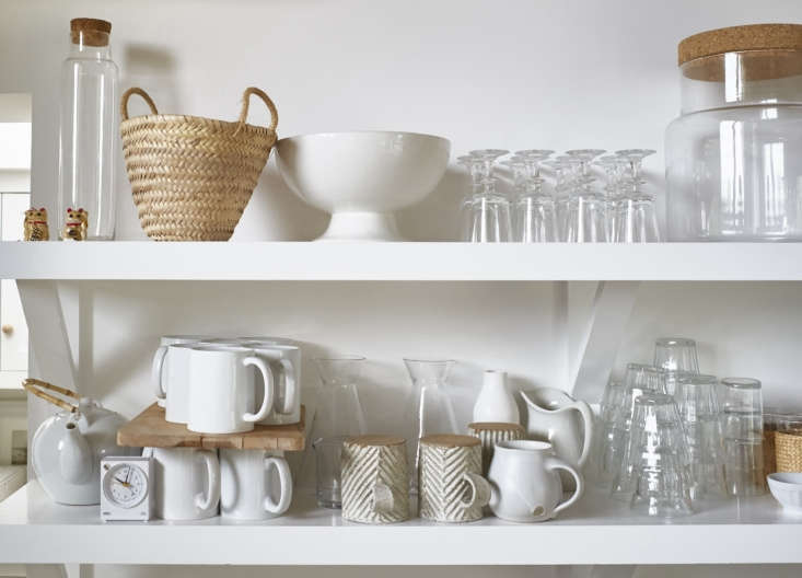 open shelves display pearson&#8\2\17;s collections of glassware and ceramic 18