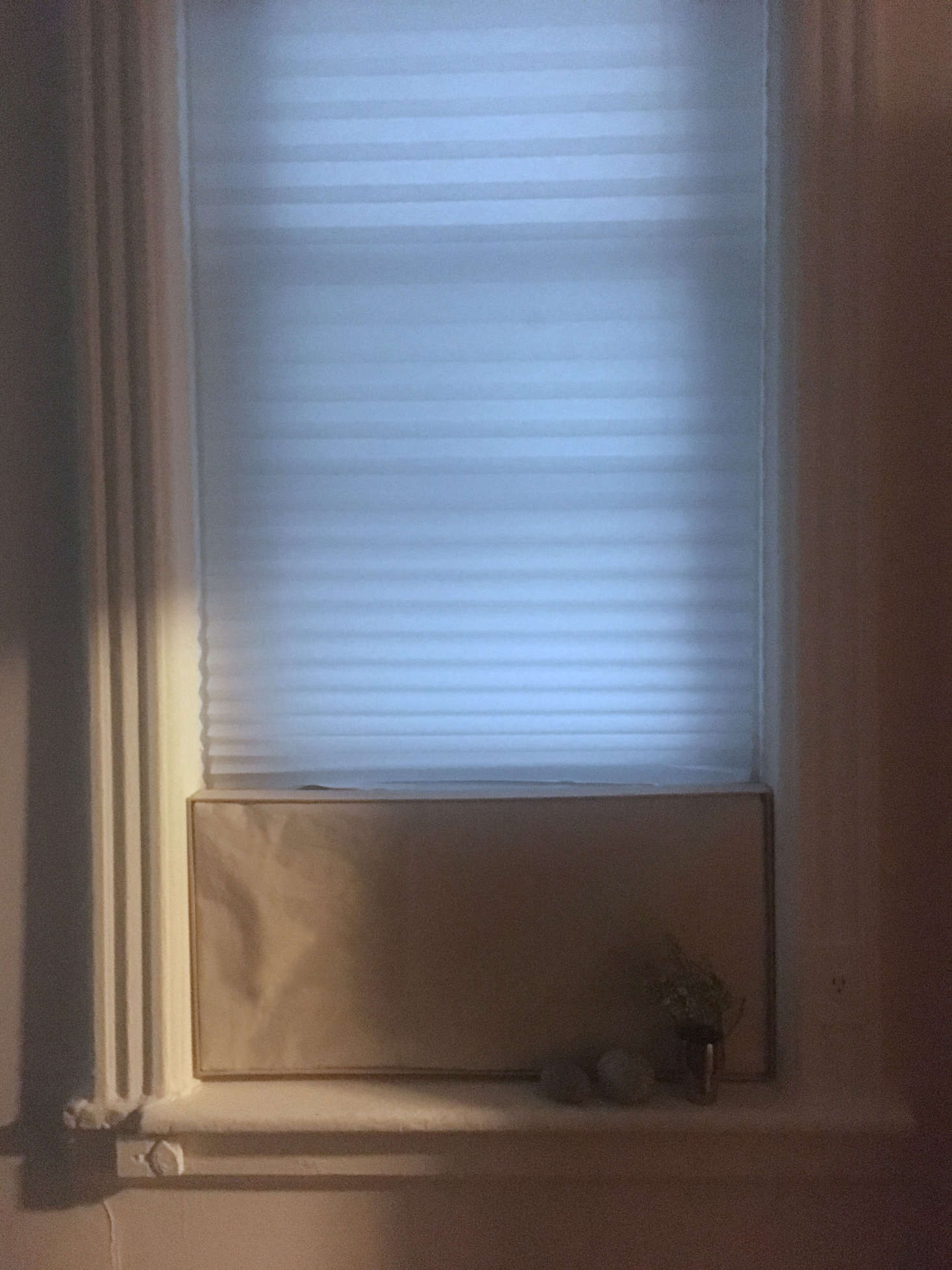 The new window in evening, with light coming from the kitchen.