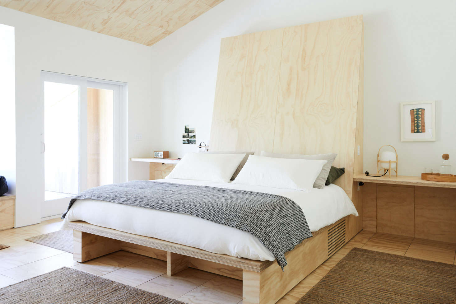 The Sanford Suite features a large outdoor deck, a king bed, and separate living, dining and kitchenette spaces.