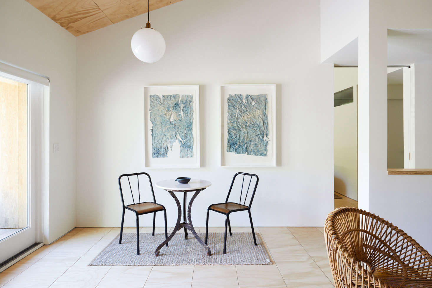 A dining nook; to the right is the living area.