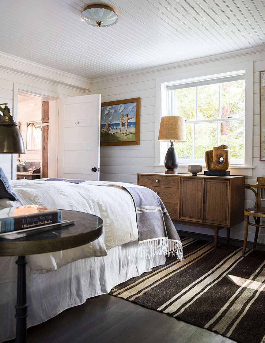 The primary bedroom with an ensuite bath. The home