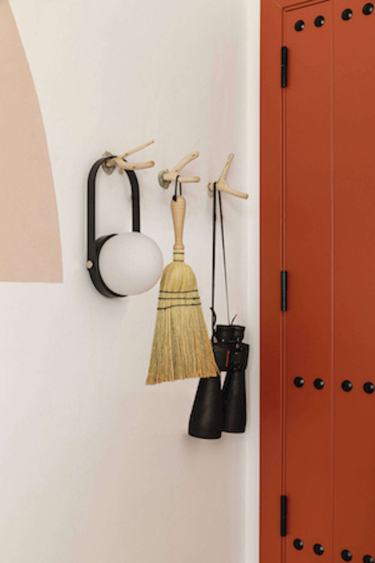 Guest rooms have modern-rustic paneled doors in Meilichzon