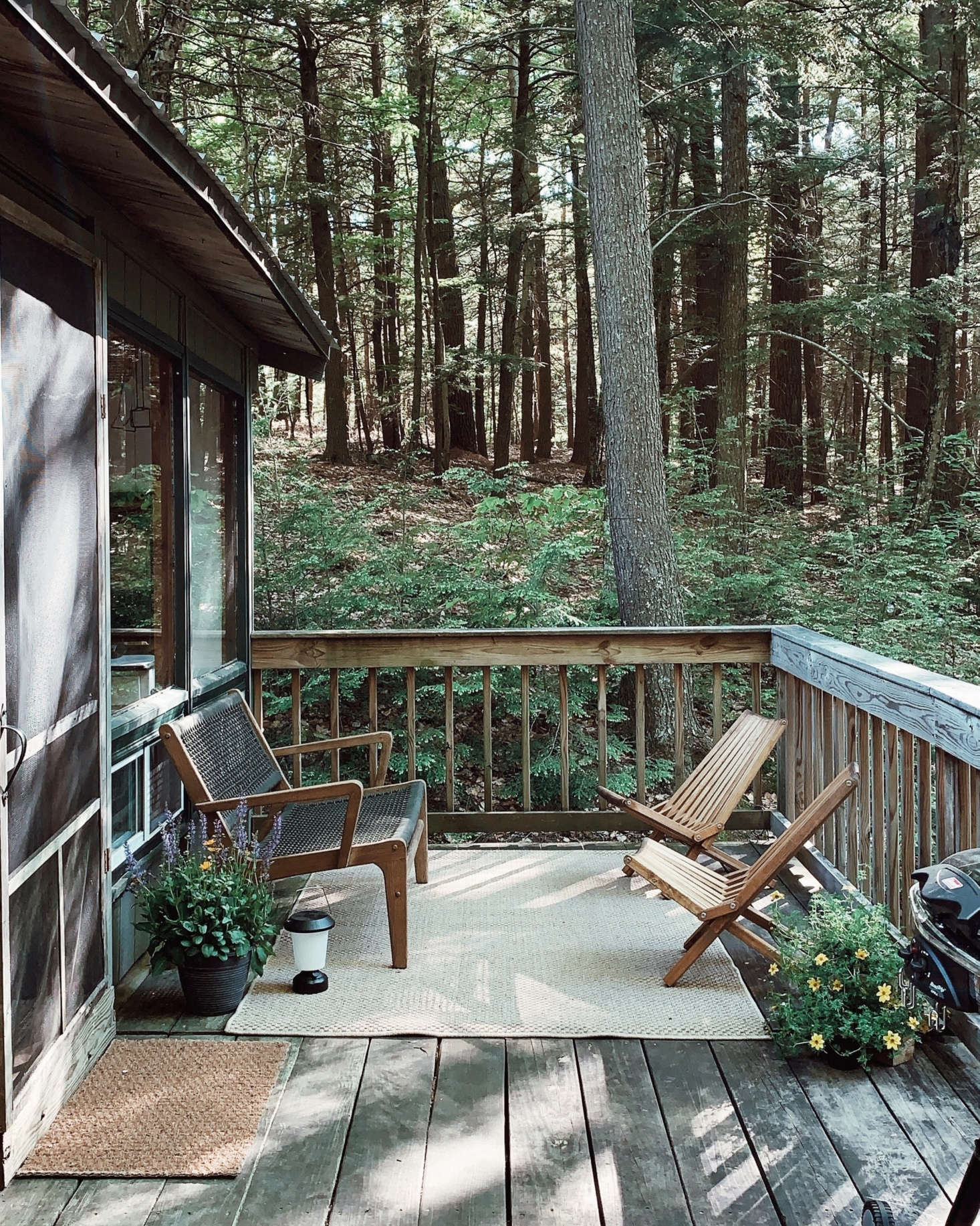 The deck is a quiet place for reading or relaxing. It also serves as a spot for outdoor showers, of sorts: 