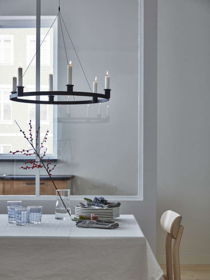 the powder coated aluminum and steel chandelier holds six candles; \$49.99. 21