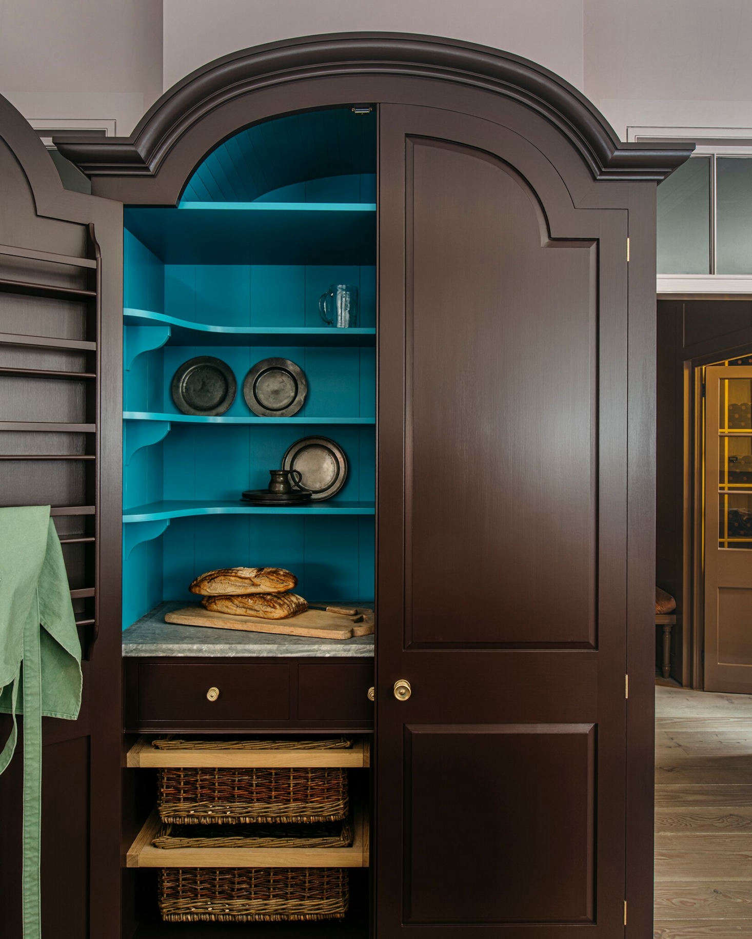 The cupboard interior is painted in Tea Caddy, which was 