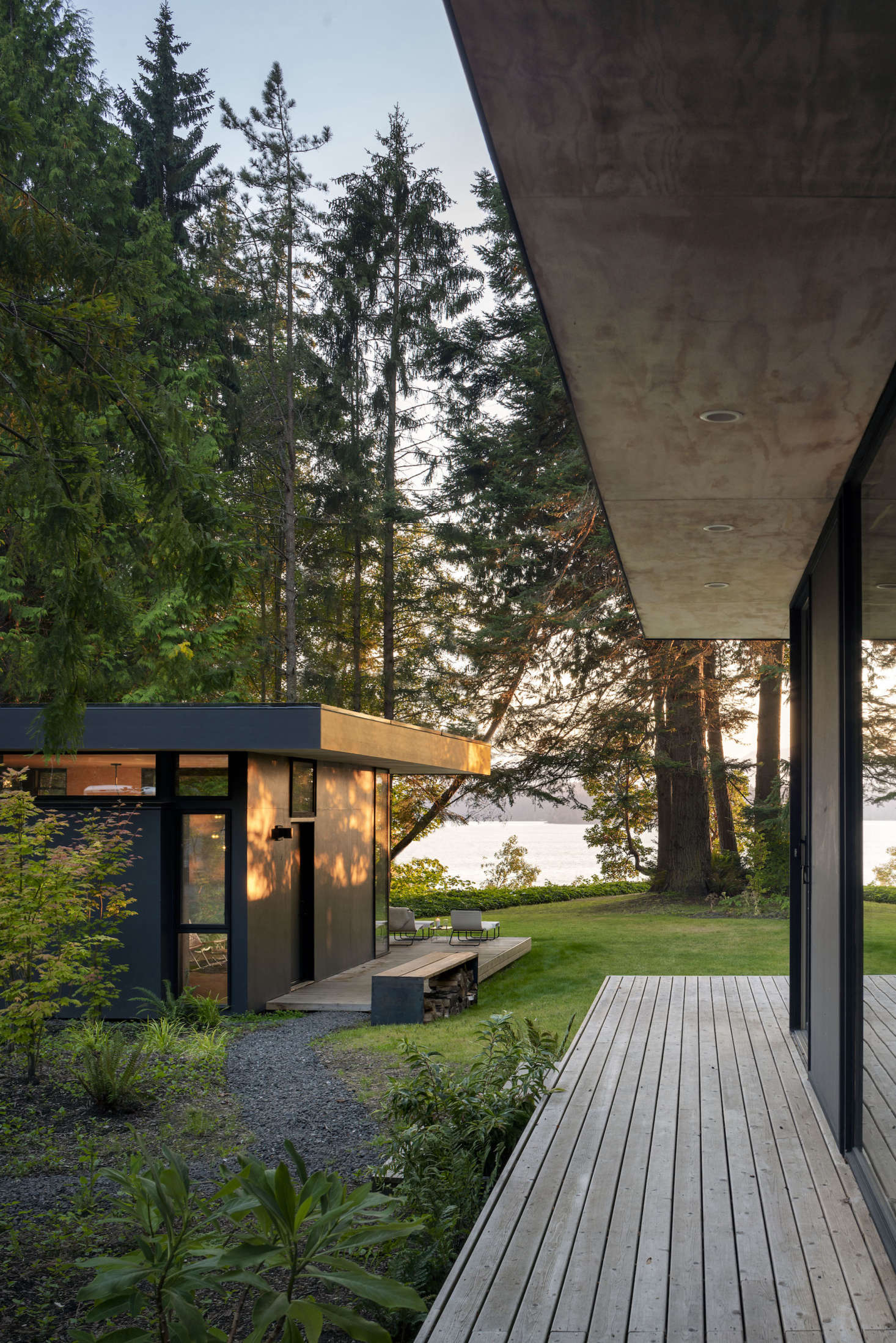 A gravel path leads from the main building to the bunkhouse.
