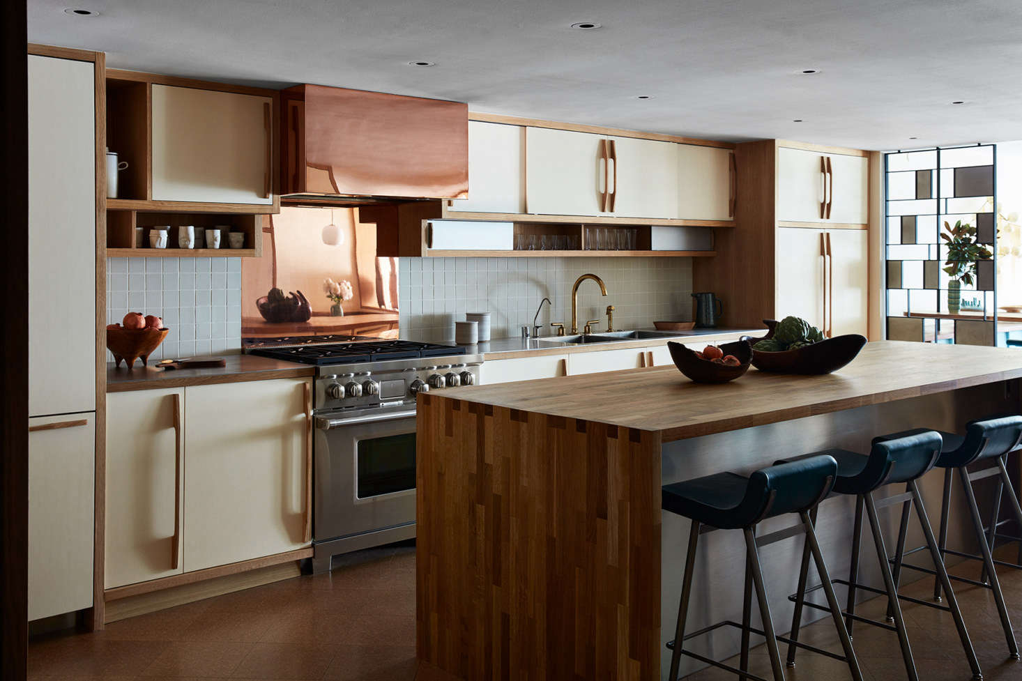 The white oak cabinets are painted “Blanc,