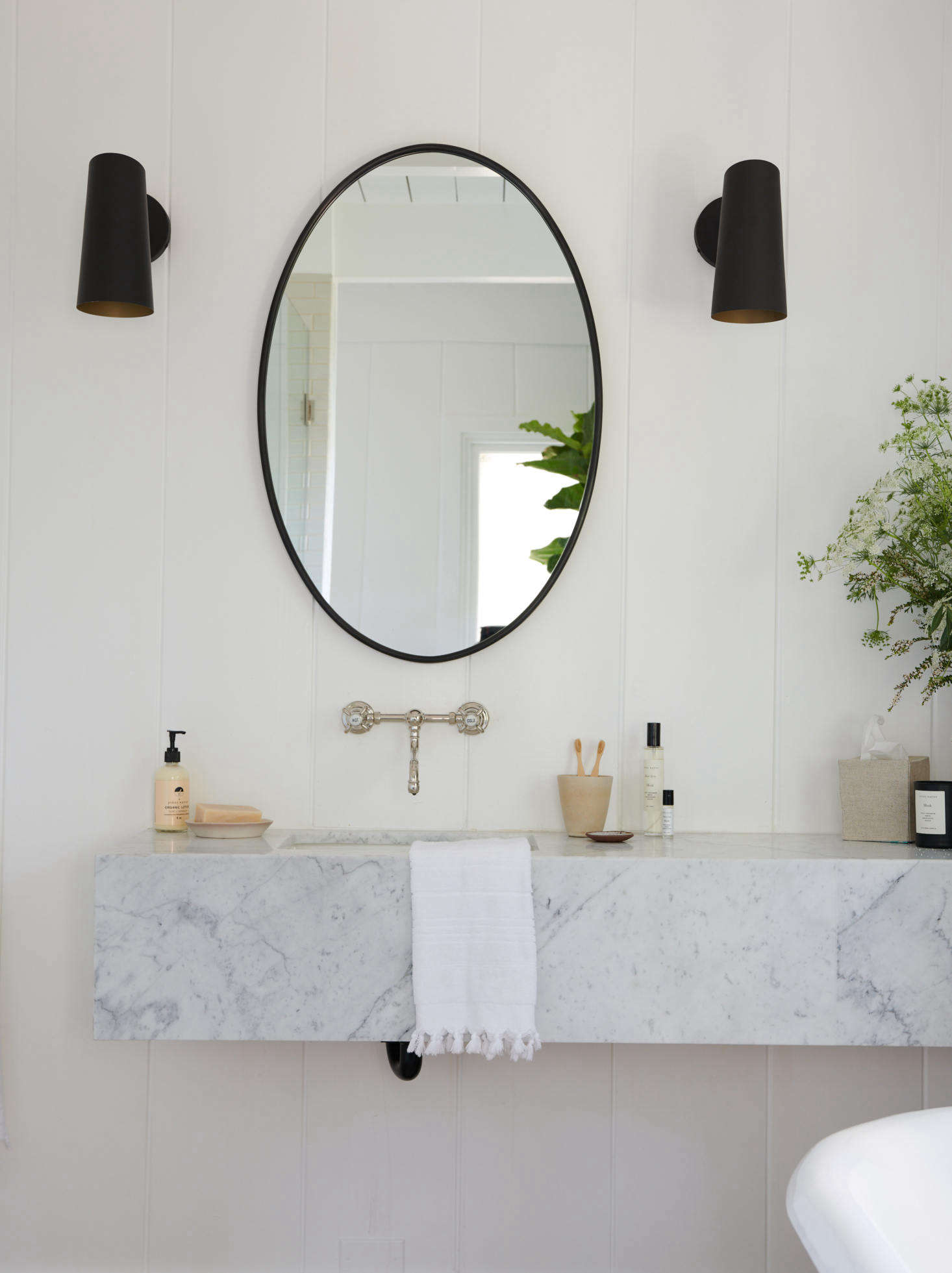 In one of the bathrooms, a slab of marble left over from the kitchen counters was re-fitted into a sink.