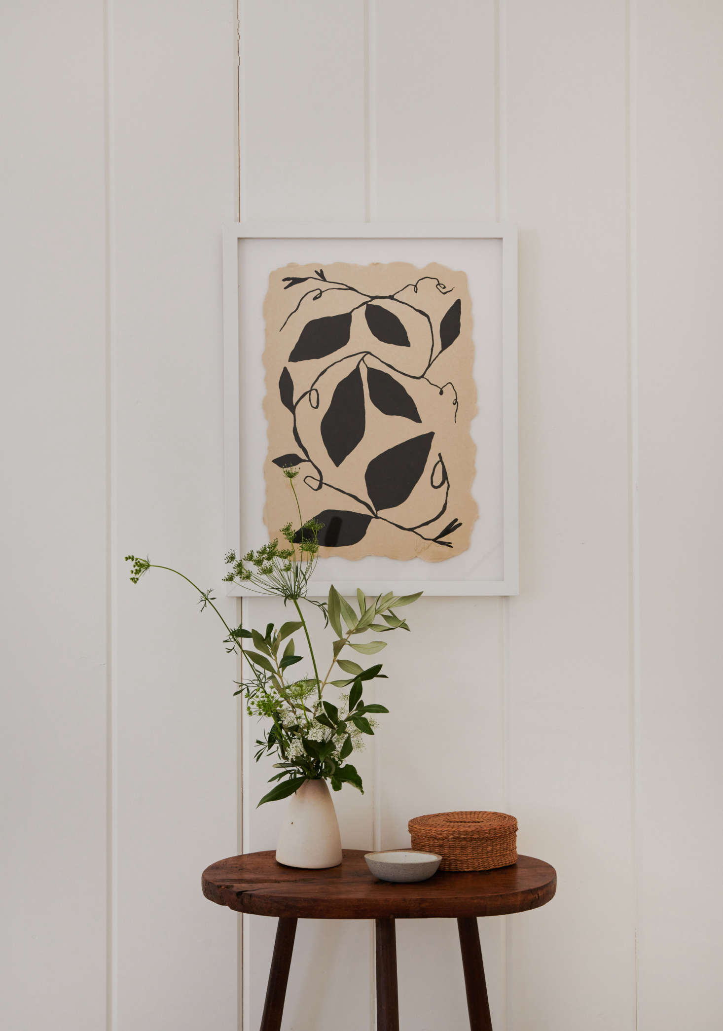 The framed print is by Tennessee-based artist Kate Roebuck via Uprise Art, which provided art throughout the house.