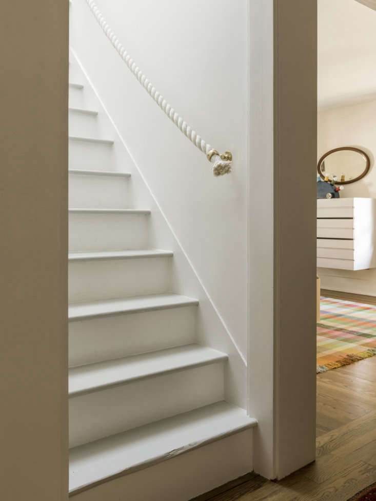 a  classic new england rope stair rail, a remodelista favorite, leads to t 32