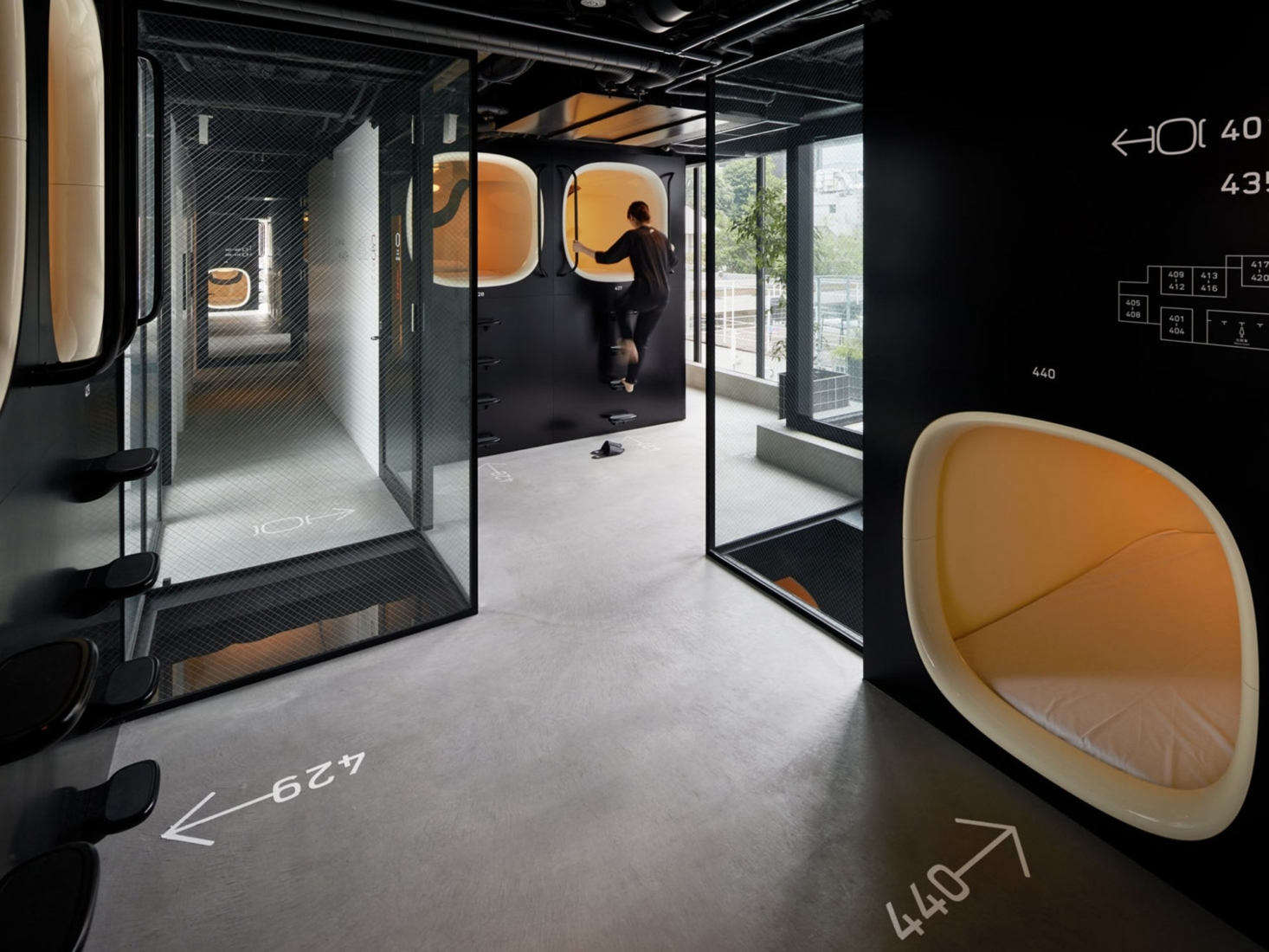 You choose a high or low sleeping pod (with lights, outlets, and privacy curtains)—these are at the 9h Asakusa in Tokyo. Though just big enough for one, the berths to our surprise were enveloping rather than oppressive. As my son pointed out, 