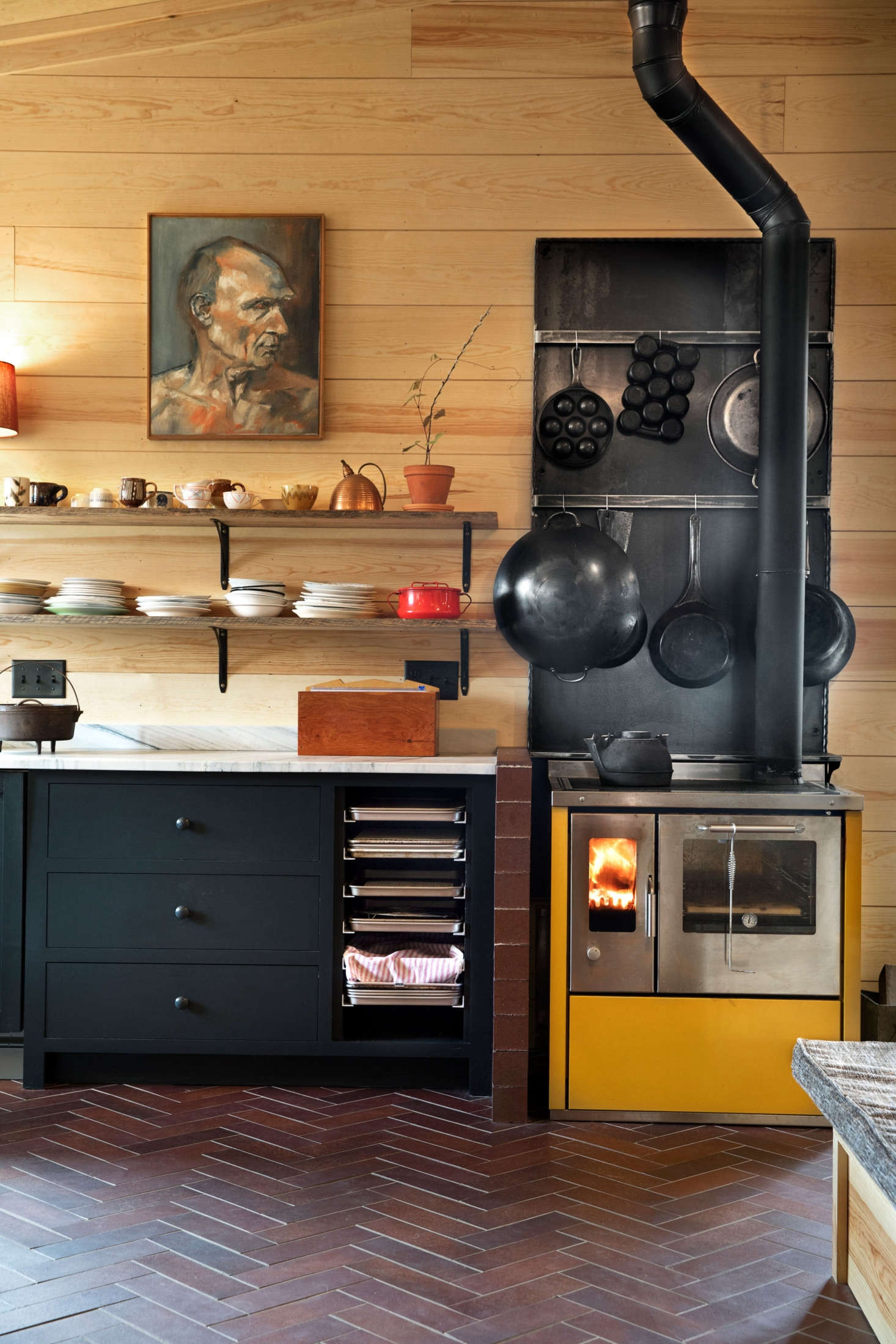 The kitchen was done on a budget, but Amys only splurge was a DeManincor Italian wood stove. 