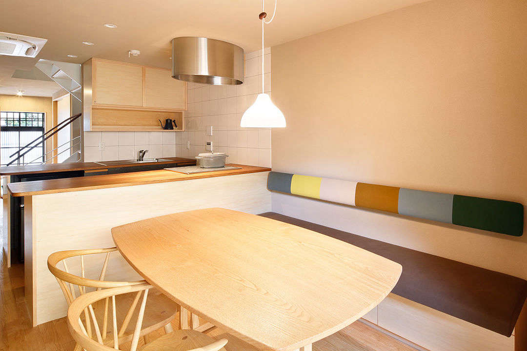 The kitchen comes with a Minä Perhonen banquette. The house has two bedrooms—two single beds and two futons—and sleeps four.