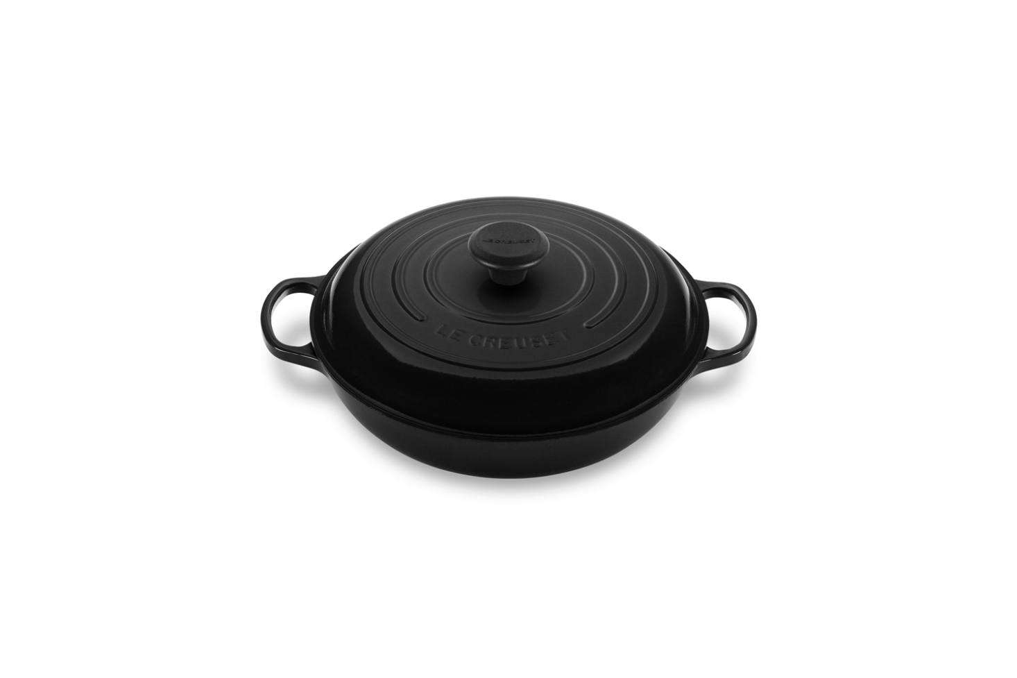 Le Crueset is a great example of porcelain enamel cast iron cookware. Their cast iron pans are finished with a matte black or glossy beige enamel that withstands high-temperature cooking and is naturally non-toxic and lead-free. Shown here is the Le Creuset Signature Cast Iron data-src=