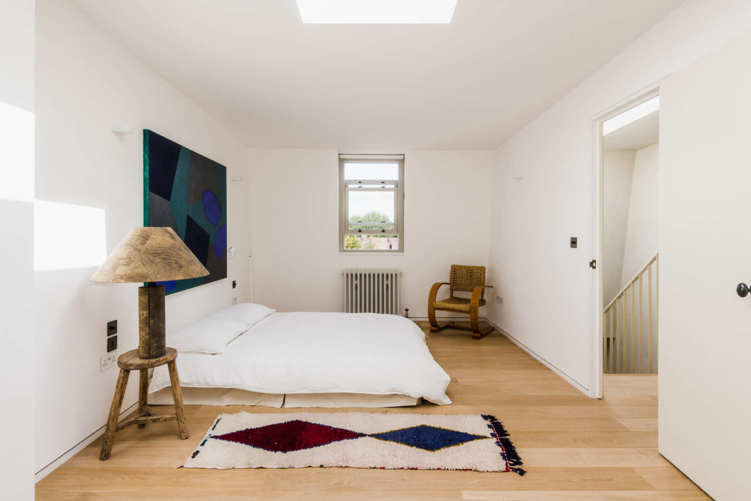 In addition to the main bedroom on the second floor and the two bedrooms on the third floor, there