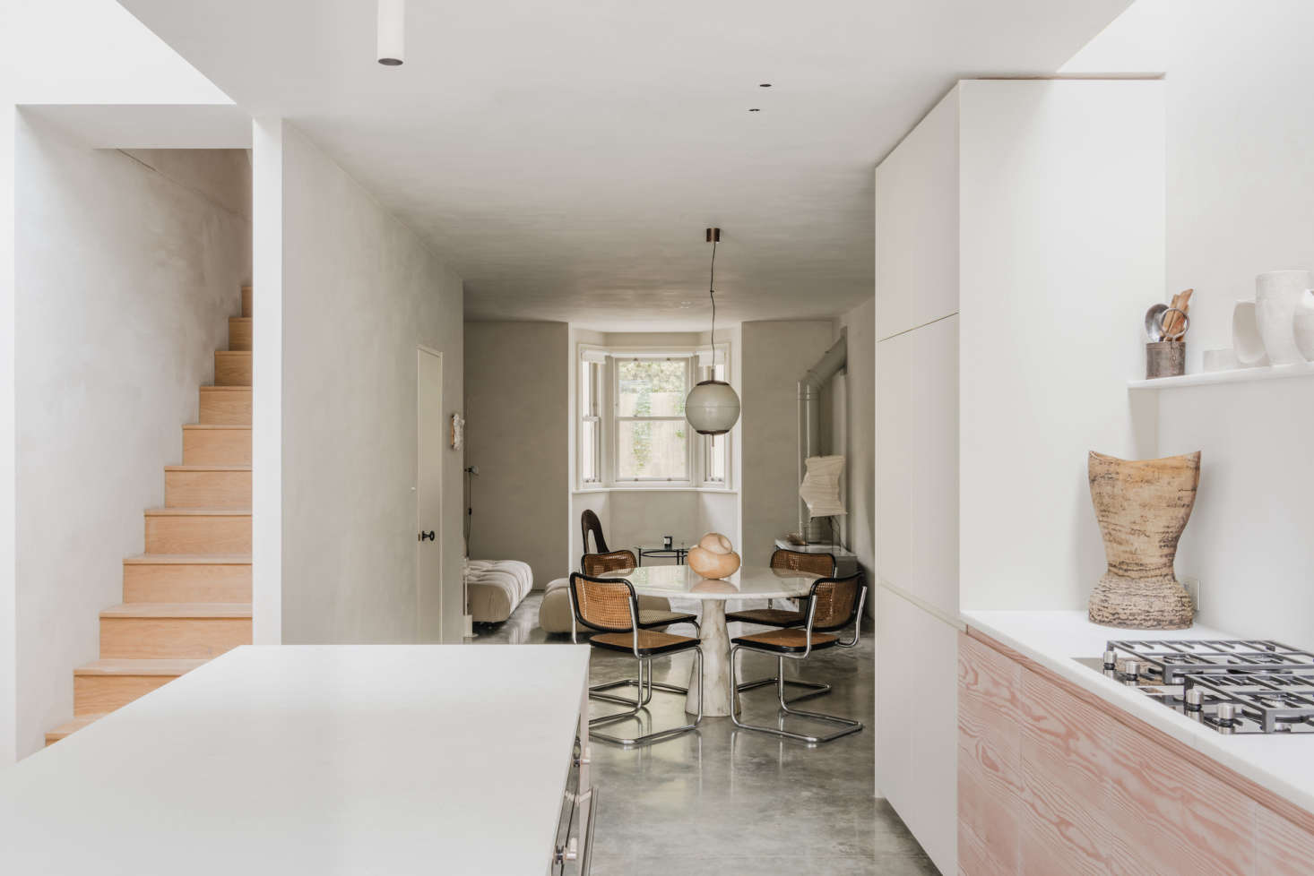 The view from the kitchen into the combo dining area and sitting room.