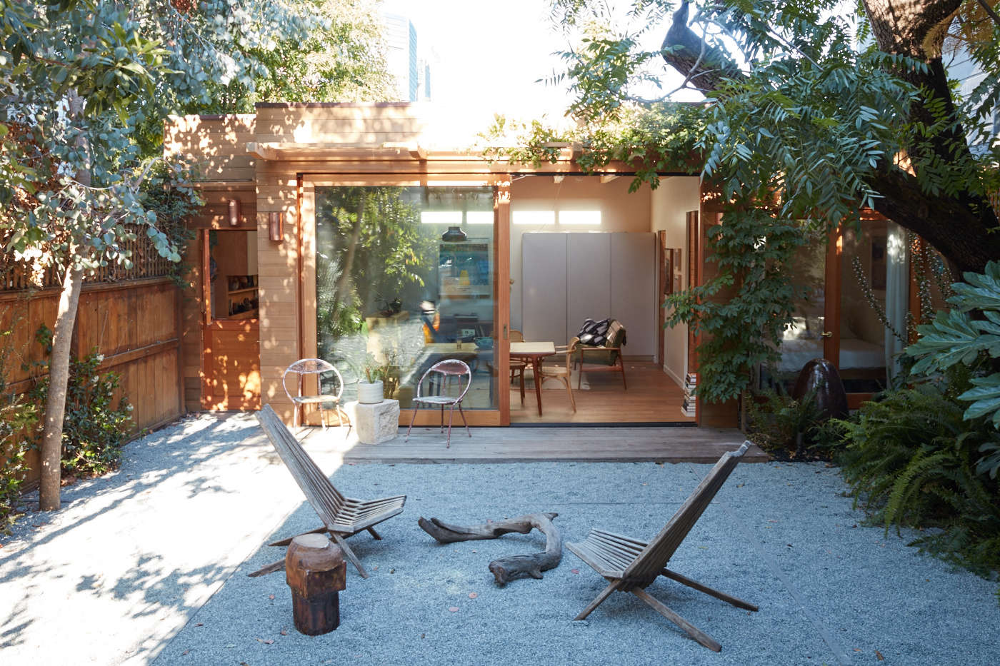The neglected backyard is now a peaceful outdoor space with decomposed granite underfoot. 