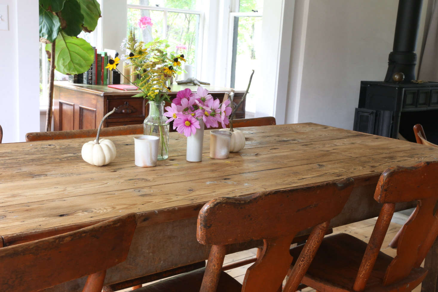 The dining table is one of several pieces that the couple found during their first pilgrimage to the Brimfield flea market. 