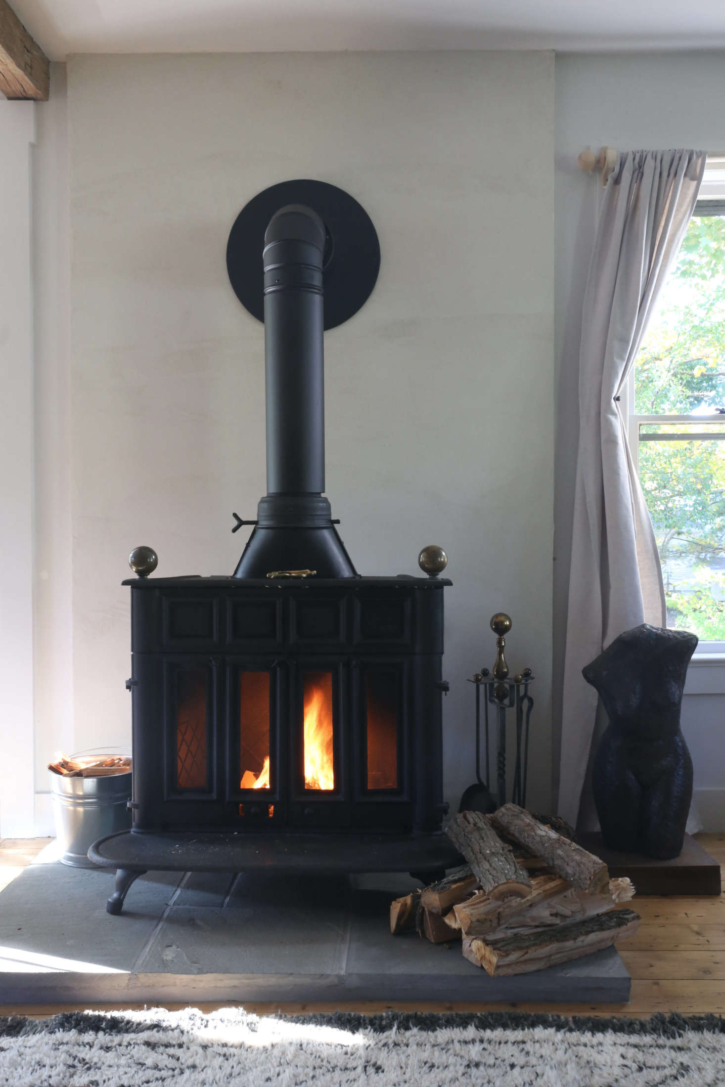 The vintage Franklin stove came from Hoffman